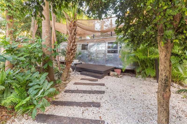 Jungly ‘Paradisiacal Retreat’ With Classic Airstream Off South Miami Avenue Lists for $1.45M